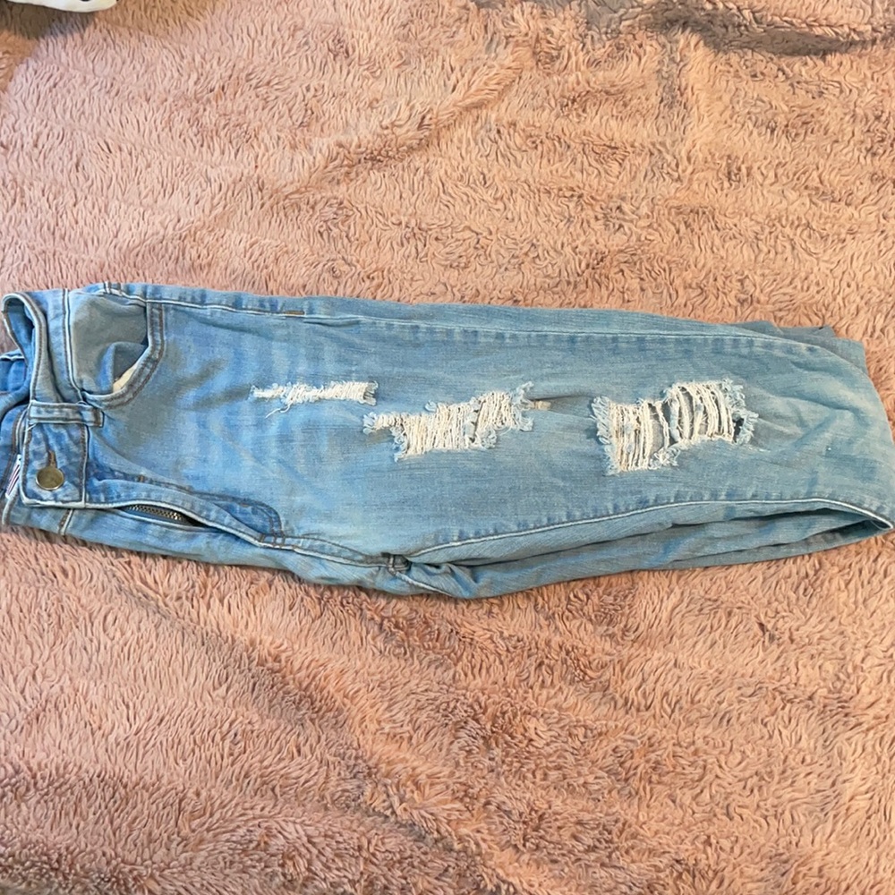 Distressed light denim washed skinny jeans